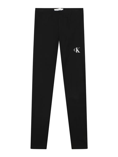 Se Calvin Klein Jeans Leggings  sort / hvid ved About You