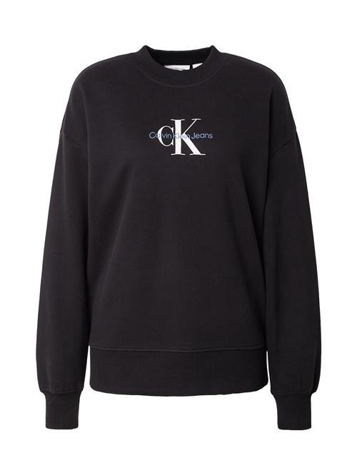 Se Calvin Klein Jeans Sweatshirt  lyseblå / sort / hvid ved About You