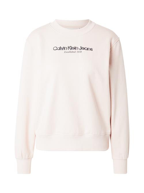 Se Calvin Klein Jeans Sweatshirt  pastelpink / sort ved About You