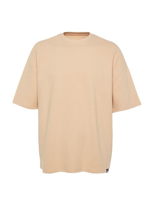 Se Trendyol Bluser & t-shirts  lysebeige / sort ved About You