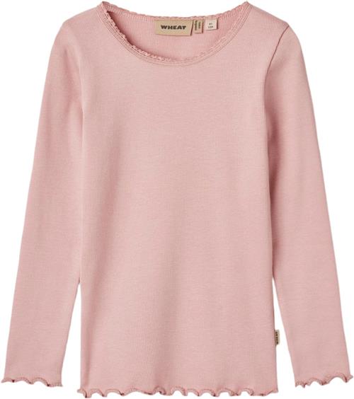 Se Wheat Langærmet Rib Tshirt Reese Str 110 / 5 år - Rose Frost Langærmede T-shirts Bomuld hos Magasin ved Magasin