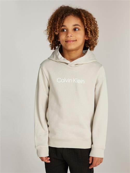 Se Calvin Klein Inst. Logo REG. Terry Hoodie Str 10 - Pelican Sweatshirts hos Magasin ved Magasin