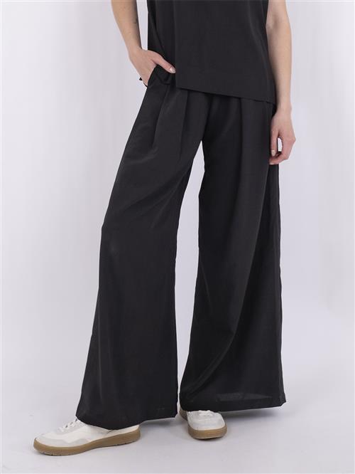 Se Neo Noir Lana Pants Kvinde Black Bukser Med Brede Ben Str 42 - hos Magasin ved Magasin