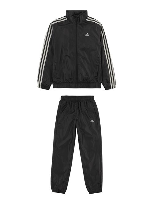 Se ADIDAS PERFORMANCE Træningsdragt 'Essentials'  sort / hvid ved About You