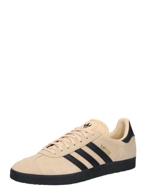 Se ADIDAS ORIGINALS Sneaker low 'GAZELLE MESSI'  sand / guld / sort ved About You