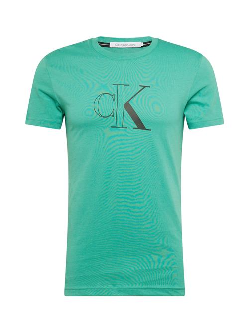 Se Calvin Klein Jeans Bluser & t-shirts  turkis / sort ved About You