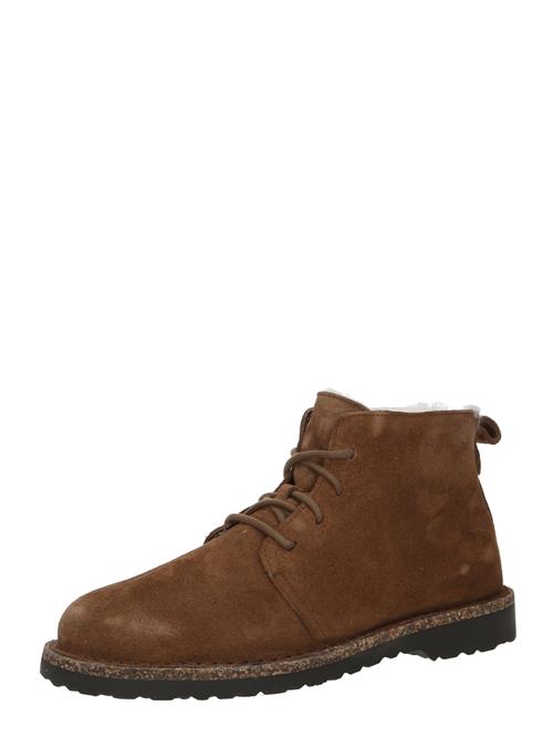 Se BIRKENSTOCK Snørestøvletter 'Uppsala Mid Shearling LEVE'  cognac ved About You