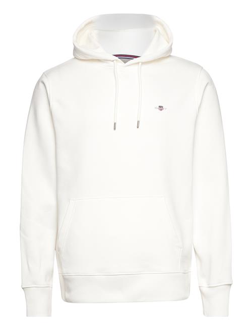 Se GANT Reg Shield Hoodie GANT White ved Booztlet