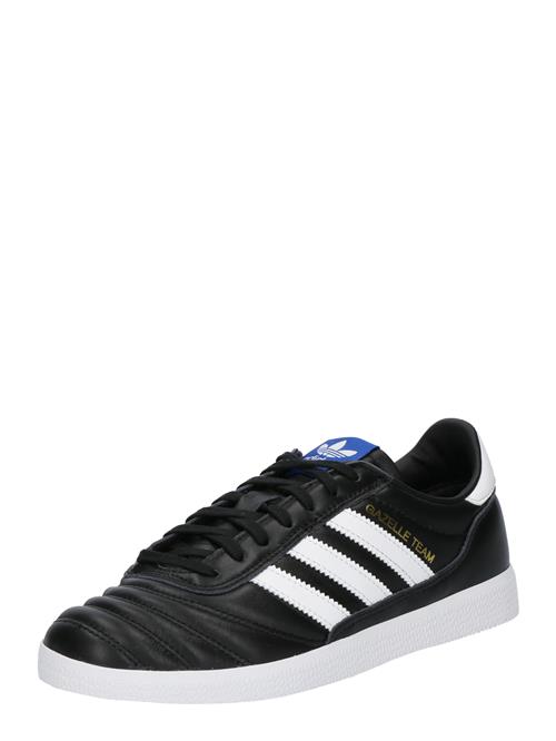 Se ADIDAS ORIGINALS Sneaker low 'GAZELLE TEAM'  blå / sort / hvid ved About You