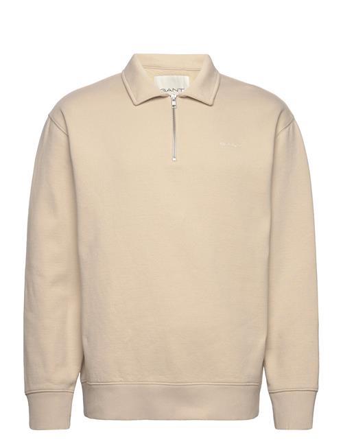 Se GANT Logo Half Zip GANT Beige ved Booztlet