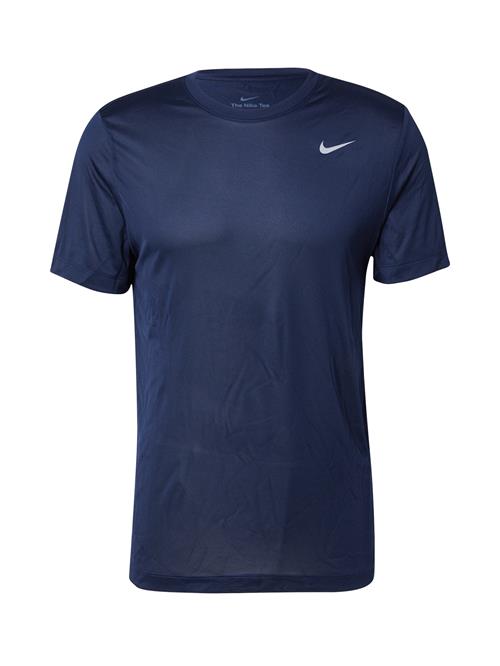 Se NIKE Funktionsskjorte  navy / hvid ved About You