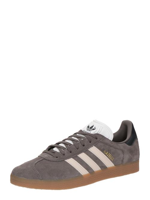 Se ADIDAS ORIGINALS Sneaker low 'GAZELLE REKIVE'  guld / mørkegrå / hvid ved About You