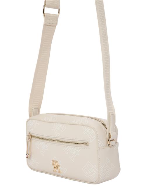 Se TOMMY HILFIGER Skuldertaske  lysebeige / guld / hvid ved About You