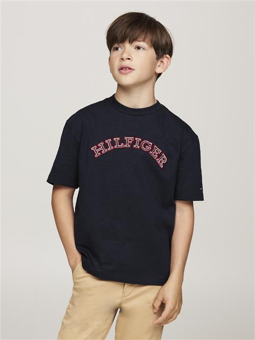 Tommy Hilfiger Monotype Embroidered REG TEE SS Str 16 - Desert Sky Kortærmede T-shirts hos Magasin