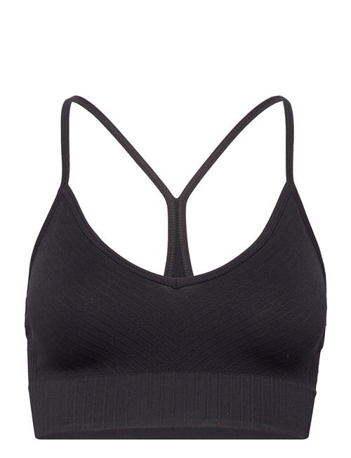 Se Casall Seamless Graphical Rib Sports Top Casall Black ved Booztlet