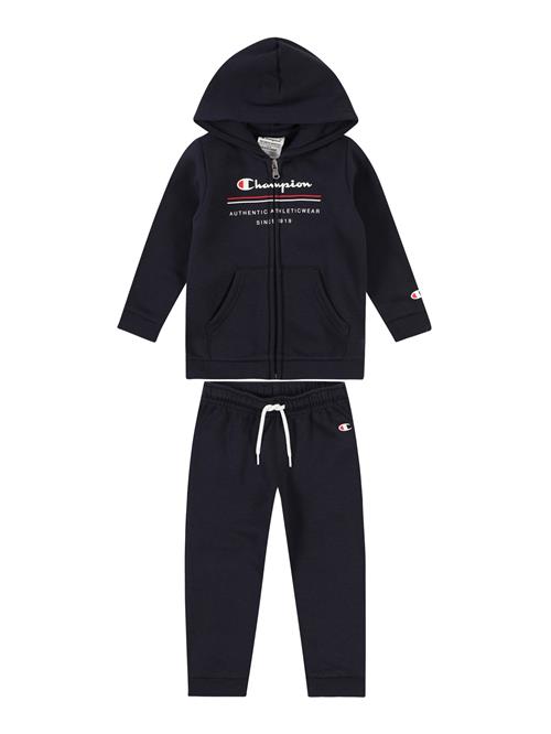 Se Champion Authentic Athletic Apparel Joggingdragt  marin / rød / hvid ved About You