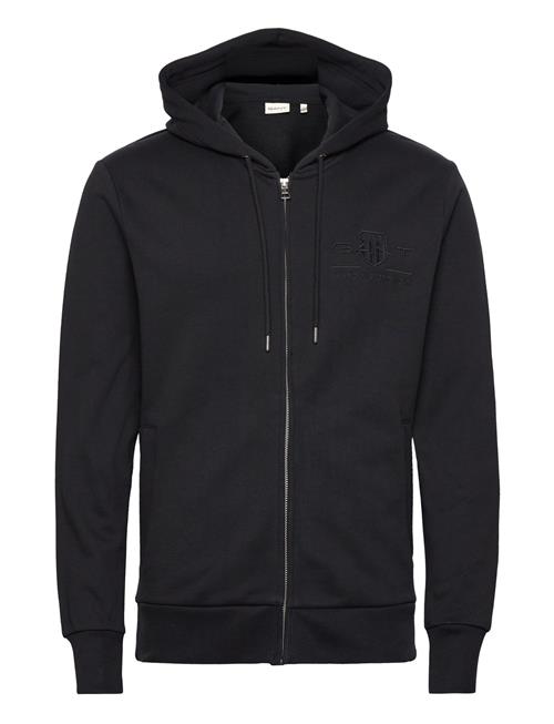 Se GANT Reg Tonal Shield Full Zip Hoodie GANT Black ved Booztlet