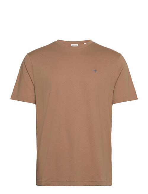 Se GANT Reg Shield Ss T-Shirt GANT Brown ved Booztlet