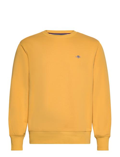 Se GANT Reg Shield C-Neck Sweat GANT Yellow ved Booztlet