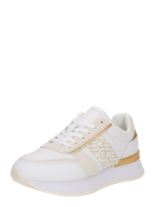 Se TOMMY HILFIGER Sneaker low  lysebeige / guld / hvid ved About You