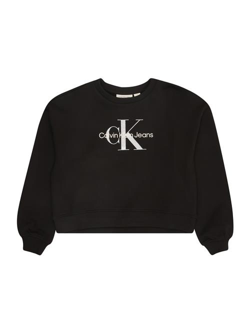 Se Calvin Klein Jeans Sweatshirt  sort / sølv / hvid ved About You