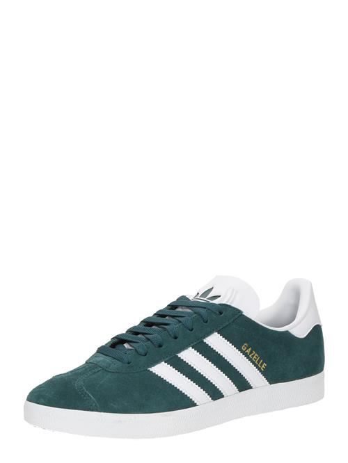 Se ADIDAS ORIGINALS Sneaker low 'Gazelle'  guld / mørkegrøn / hvid ved About You