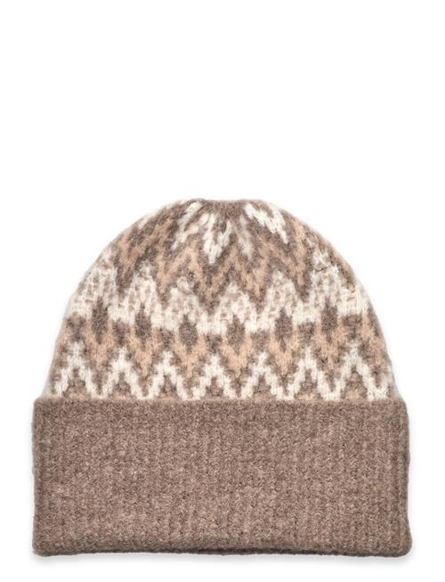 Se Cervinia Knitted Beanie Twist & Tango Beige ved Booztlet