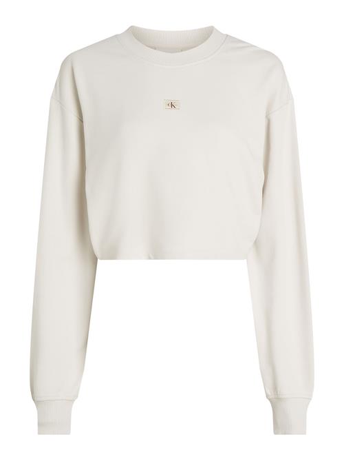 Se Calvin Klein Jeans Sweatshirt  beige ved About You