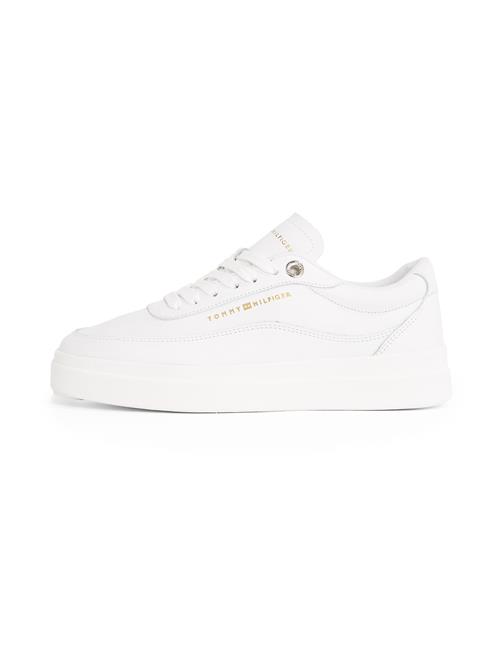 Se TOMMY HILFIGER Sneaker low  guld / hvid ved About You