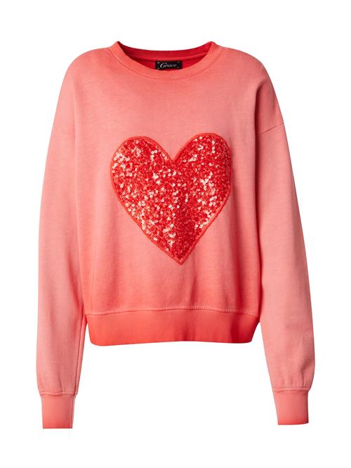 Se Grace Sweatshirt  knaldrød / melon ved About You