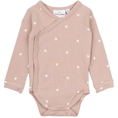 Se The New Siblings GOTS Nova Indpakning Body Adobe Rose | Lyserød | 56 cm ved Babyshop