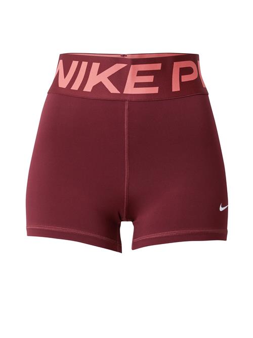 NIKE Sportsbukser  orange / mørkerød / hvid