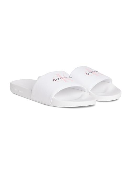Se Calvin Klein Jeans Pantoletter  lyserød / sort / hvid ved About You