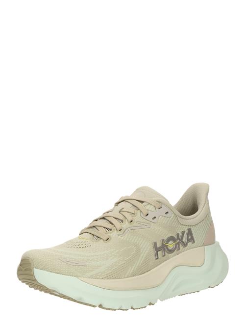Se HOKA Løbesko 'ARAHI 8'  mokka / guld / pastelgrøn ved About You