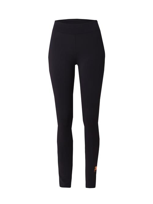 Se PUMA Leggings 'Ess'  guld / sort ved About You