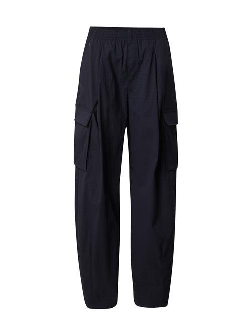 UNDER ARMOUR Sportsbukser 'Unstoppable'  sort