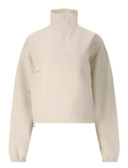 Carley W Half Zip Athlecia Cream