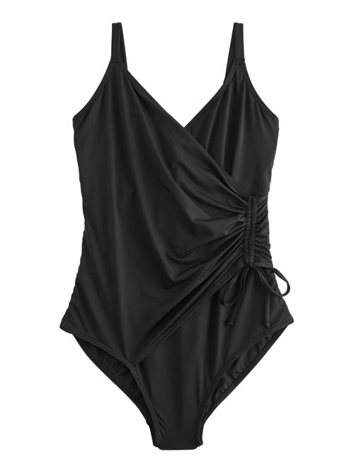 Next Formgivende badedragt  sort