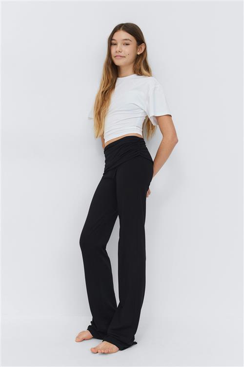 Gina Tricot - Y low waist flare trousers - Yoga pants til piger 9–14 år - Sort - 170 - Pige
