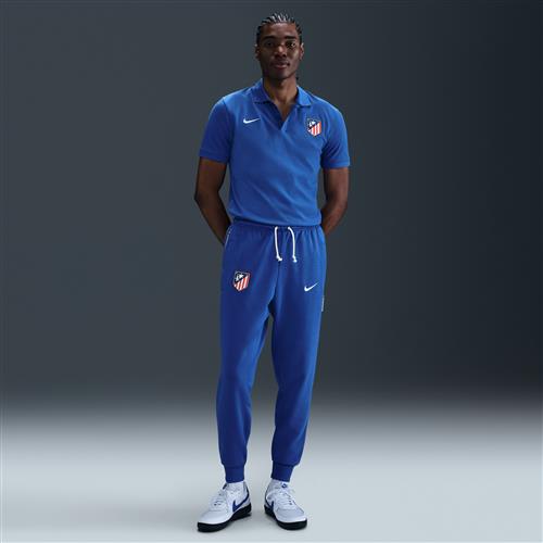 Atlético de Madrid Standard Issue Nike Dri-FIT-fodboldbukser med tapered snit til mænd - blå
