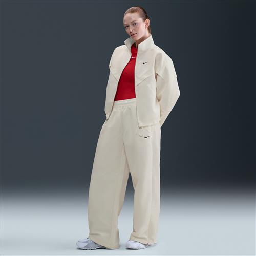 Skinnende Nike Windrunner-bukser til kvinder - hvid