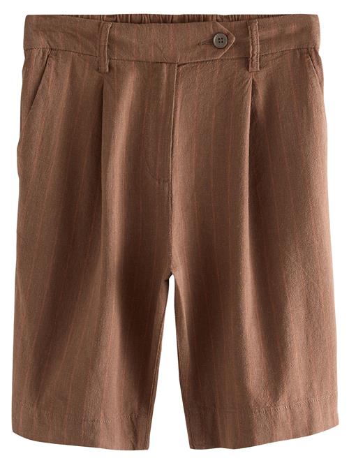 Next Bukser med lægfolder  brun / orange