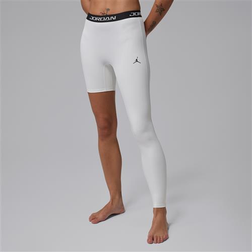 Jordan Sport-basketballtights med høj talje og enkelt ben til kvinder (venstre) - hvid