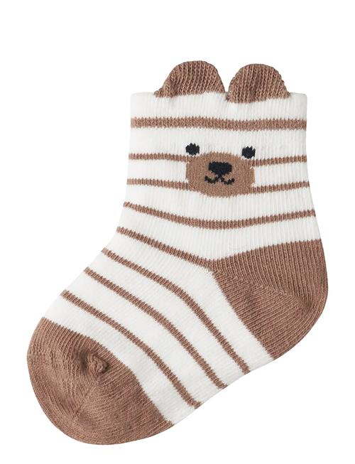 name it | Nbmdollu Sock | 50-56