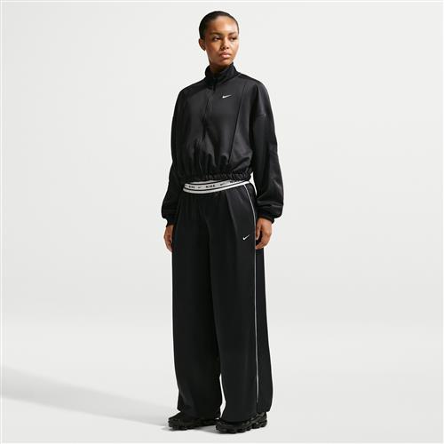 Løse Nike -satinbukser med mellemhøj talje til kvinder - sort