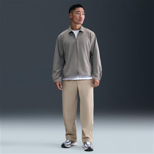 Nike 24.7 PerfectStretch Dri-FIT-chinobukser med løs pasform til mænd - brun