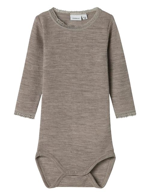 name it | Nbfwang Wool Needle Ls Body Solid Noos | 62