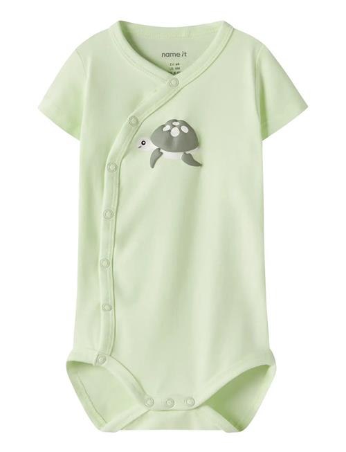 name it | Nbmvacion Ss Wrap Body | 80