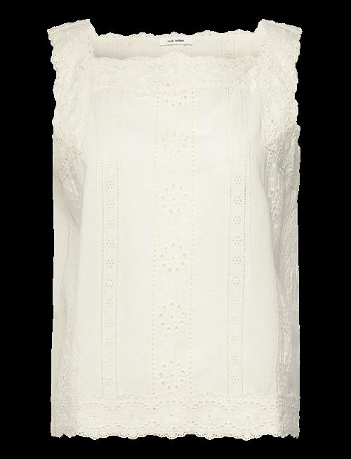 nué notes | Puerto Paez Top | 36